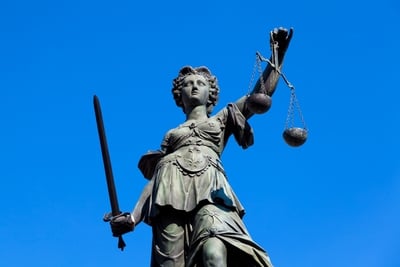 demonstrative evidence lady justice scale sword
